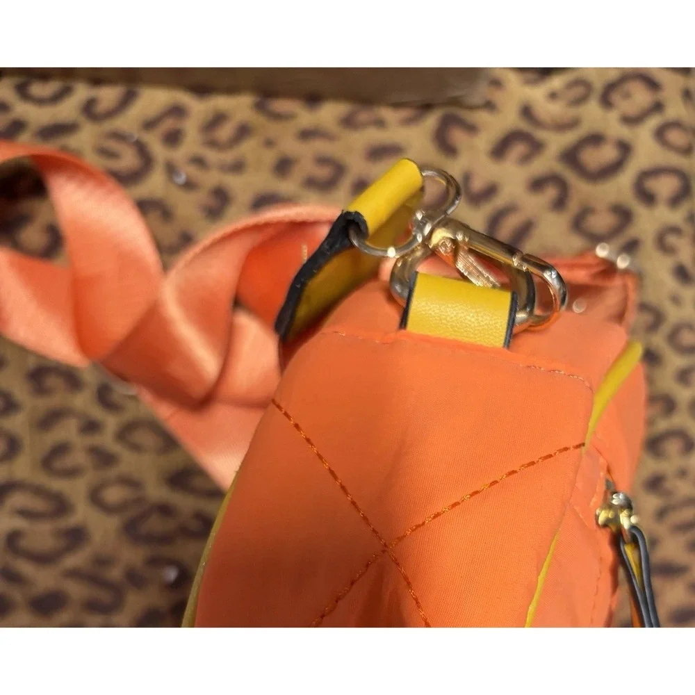 TESSIE Orange Quilted Round Crossbody Bag Yellow Trim Gold Hardware Adj Straps‎